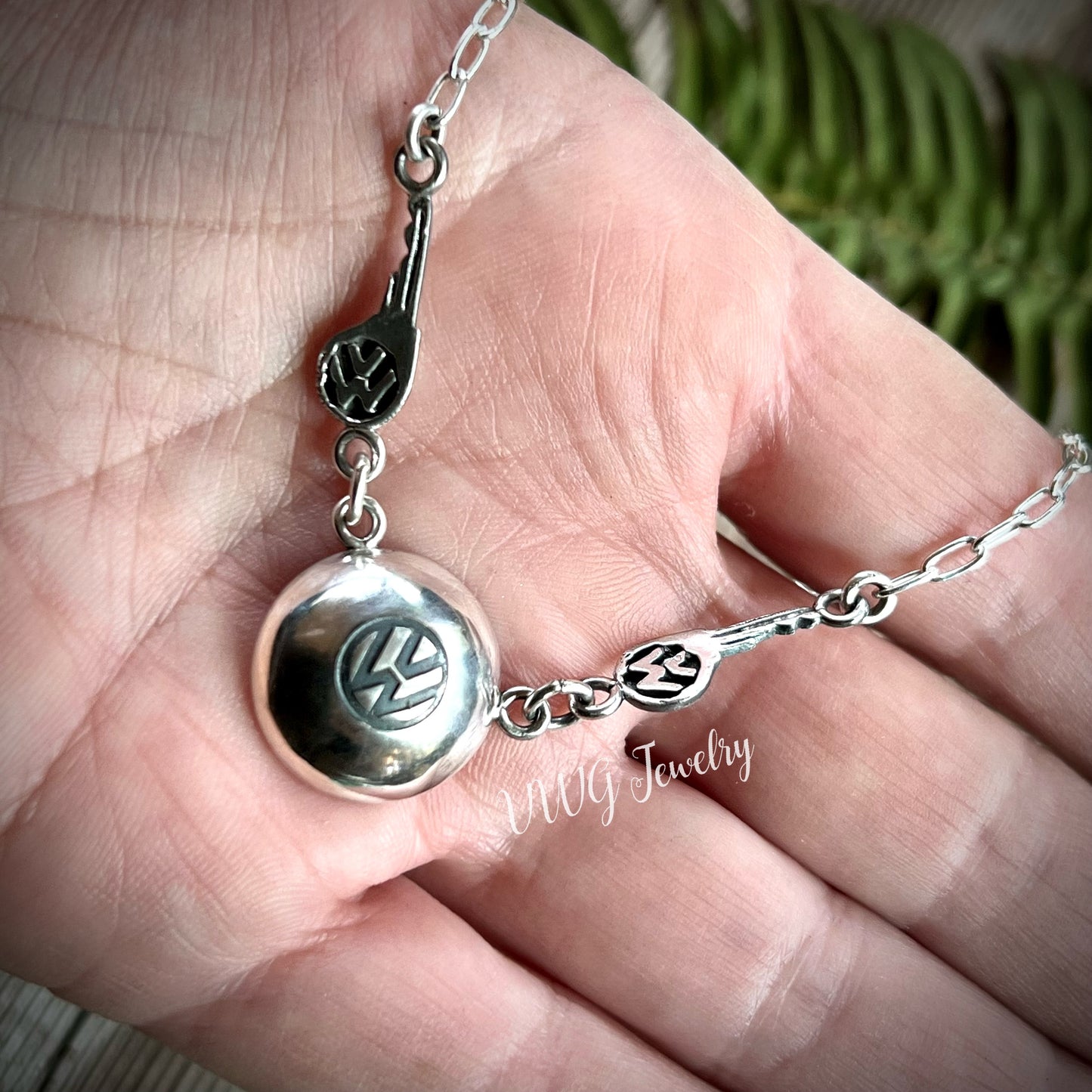 Flying Hub Cap Key Wings Sterling Necklace